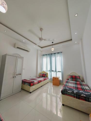 Al Khuwair Apartment | سكن شباب مشترك يومي اسبوعي شهري