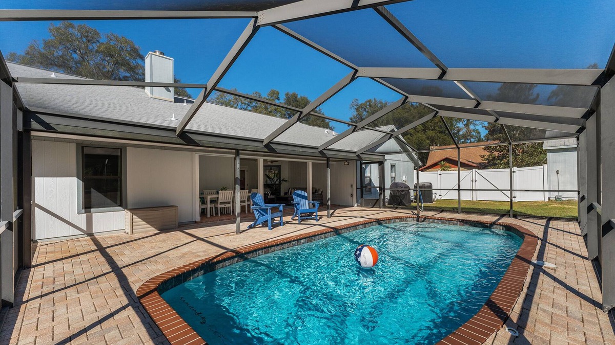 Ocala House | 1 acre private retreat with pool, firepit, volleyball, basketball & open concept