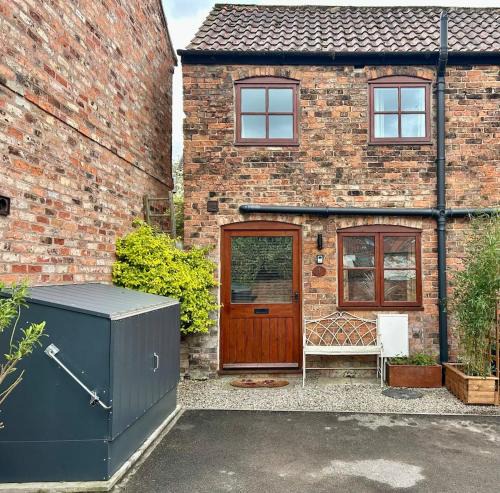 Boroughbridge House | 1 Bed cottage town centre free private parking cycle store Boroughbridge