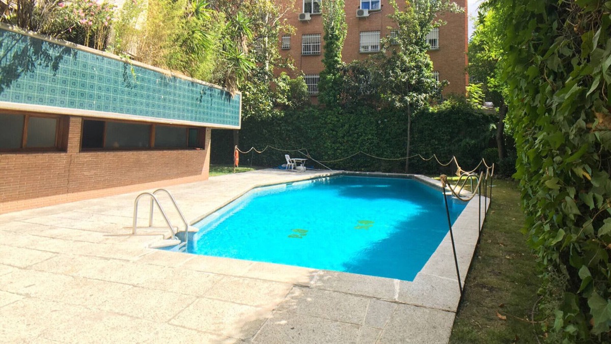 Nueva Espana Apartment | 1 bedroom flat with swimming pool and balcony in Madrid