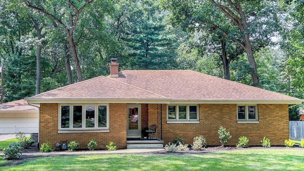South Bend House | 1 mile from ND! Beautifully renovated and roomy 4-bed, 3-bath home, wooded lot.