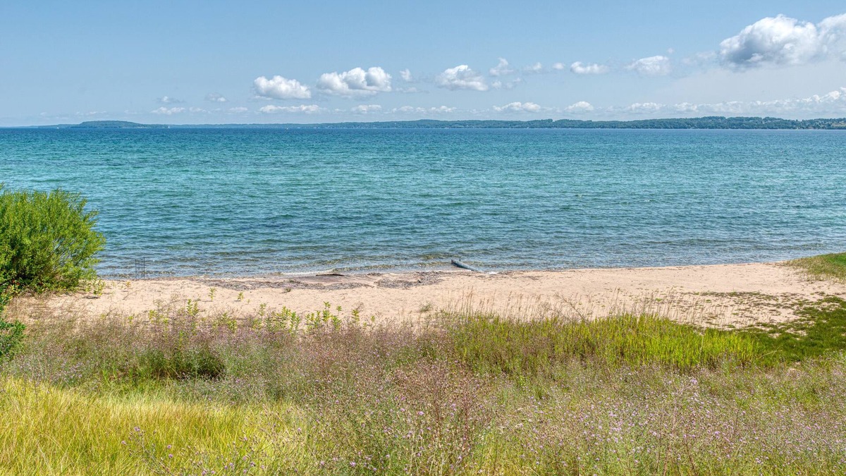 Greilickville House | 100 ft of private sandy beach on West Bay 3 miles from downtown TC. Lic#2022-53