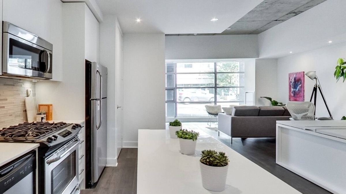 Wellington Place Condo | 100% Walk Score! NEW Large, High Ceilings, Designer Luxury Open Style Live/Work!