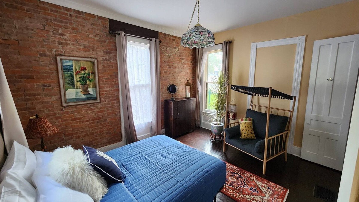 Elmira Apartment | 10ft ceiling, brick exposed apartment w/ artistic feel