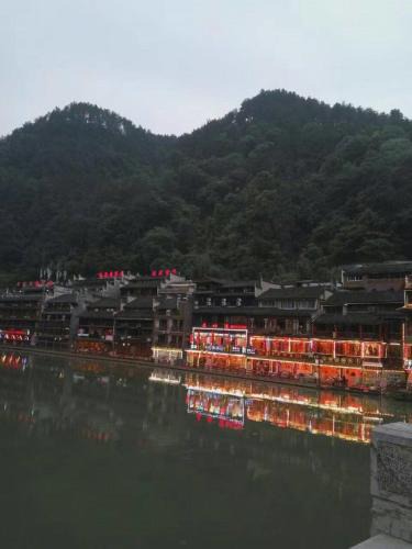 Fenghuang House | 166 Inn
