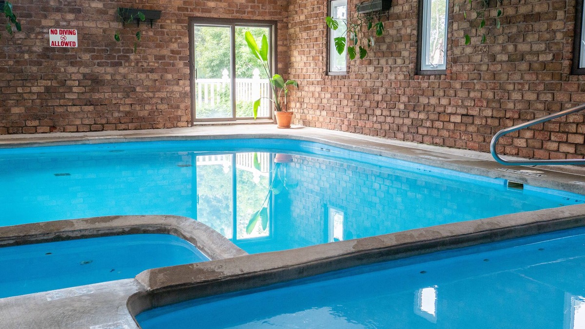 Fennville Cabin | 18 units for 10-70 people:18 baths. Indoor POOL/pickleball/volleyball/playground