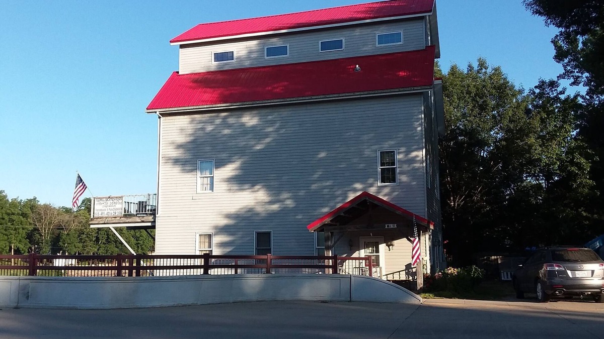 Shell Rock House | 1867 Timber-framed Flour Mill's 1st Floor Apartment Overlooks Shell Rock River