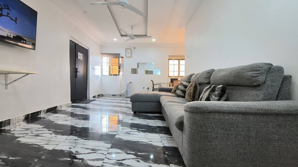 Prampram Apartment | 2-bedroom apartment in Accra with fitness room, WiFi, AC with a balcony views