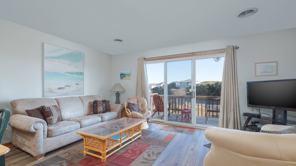 Sea Acres House | 2 bedroom condo with WiFi, outdoor shower, and access to Georgetown Sands community pool and tennis
