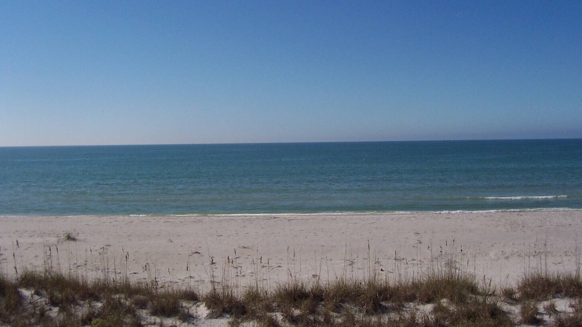 Palm Island Cottage | 2 bedrooms, 2 bath Cottages, Palm Island, Beach Access, Heated Pool, Boat Dock