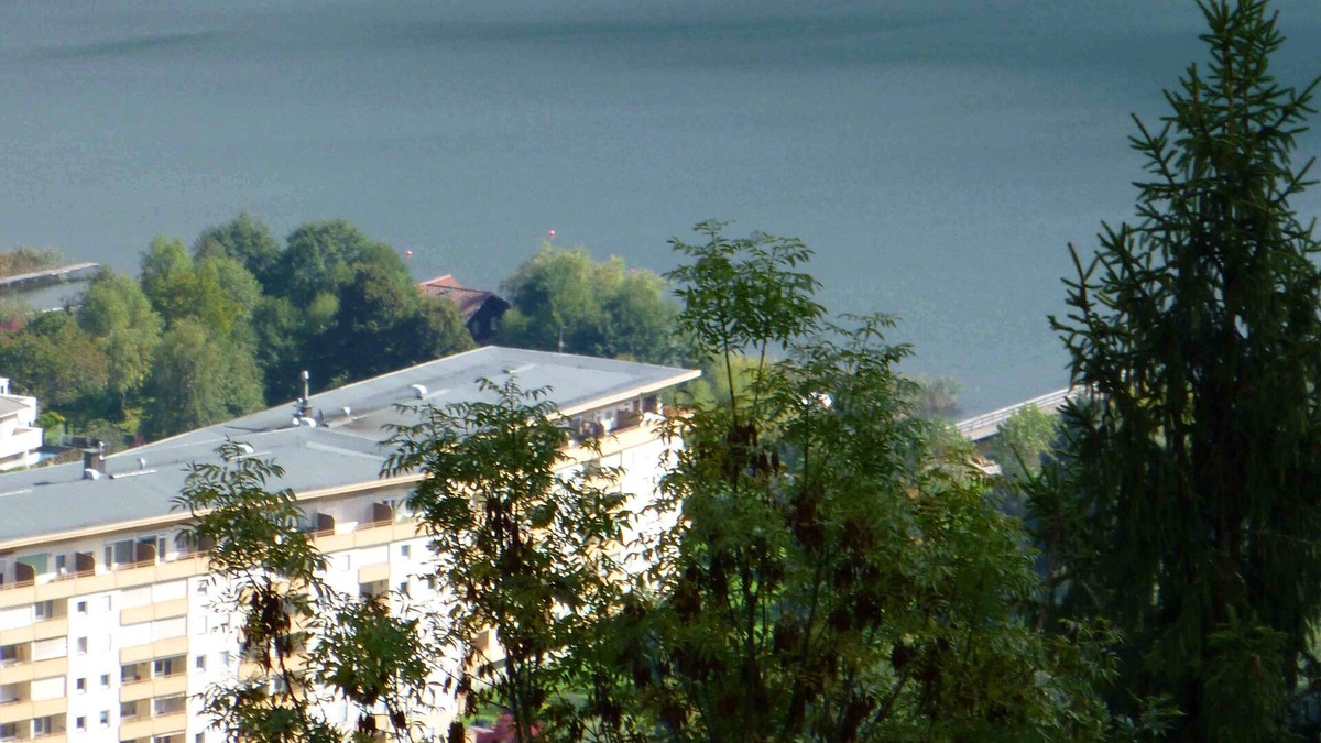 Bodensdorf Apartment | 2 bedrooms, lake view, indoor swimming pool, private beach and parking lot.