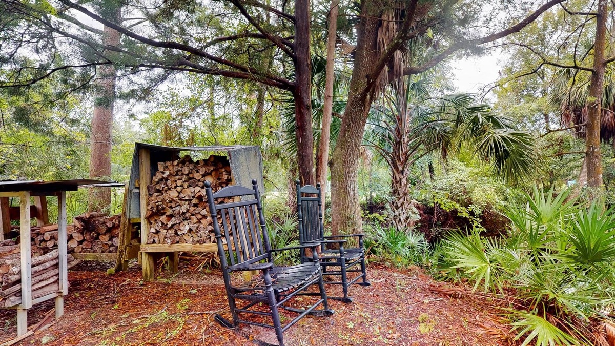 Bronson Cabin | 2 riverfront cabins with large yard, grill, firepit, canoe, & private W/D