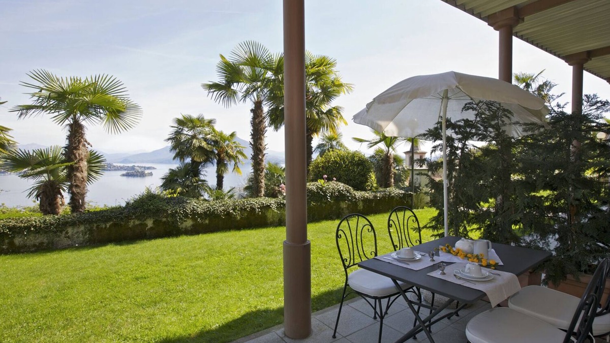 Carciano Apartment | 2-room apartment with terrace and garden in an Art Nouveau villa with communal pool