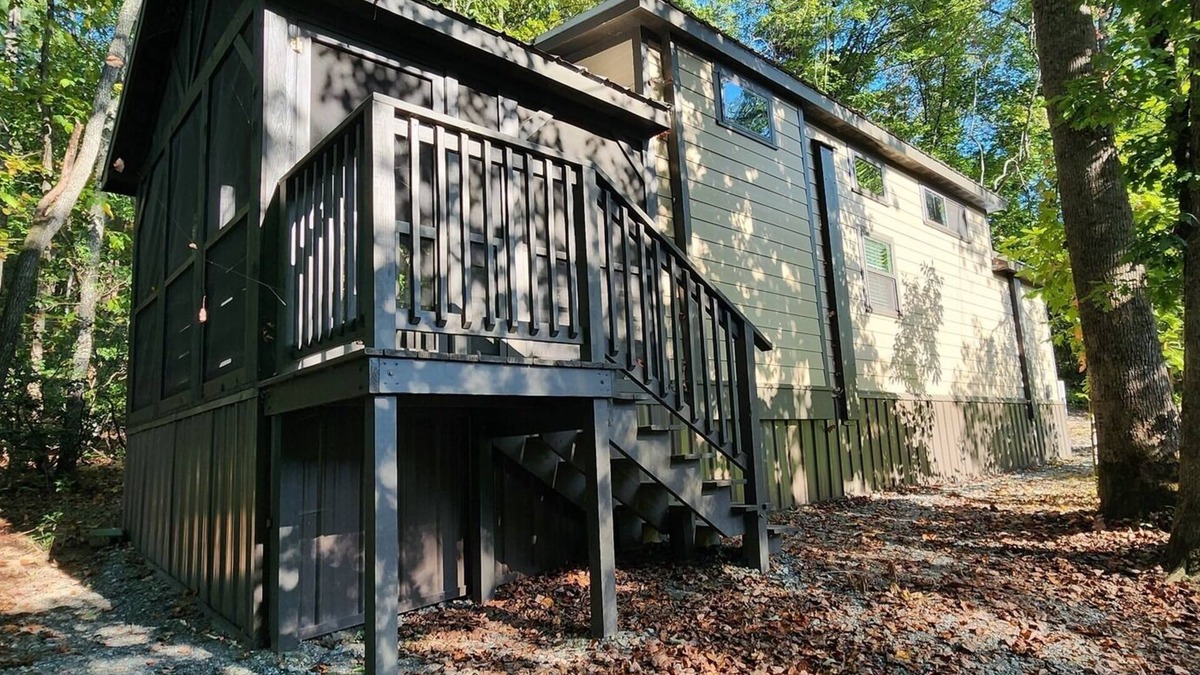 Mill Spring House | 2-story creek side tiny home, dog-friendly, screened in porch, quick walk to pool and playground, sleeps 6.