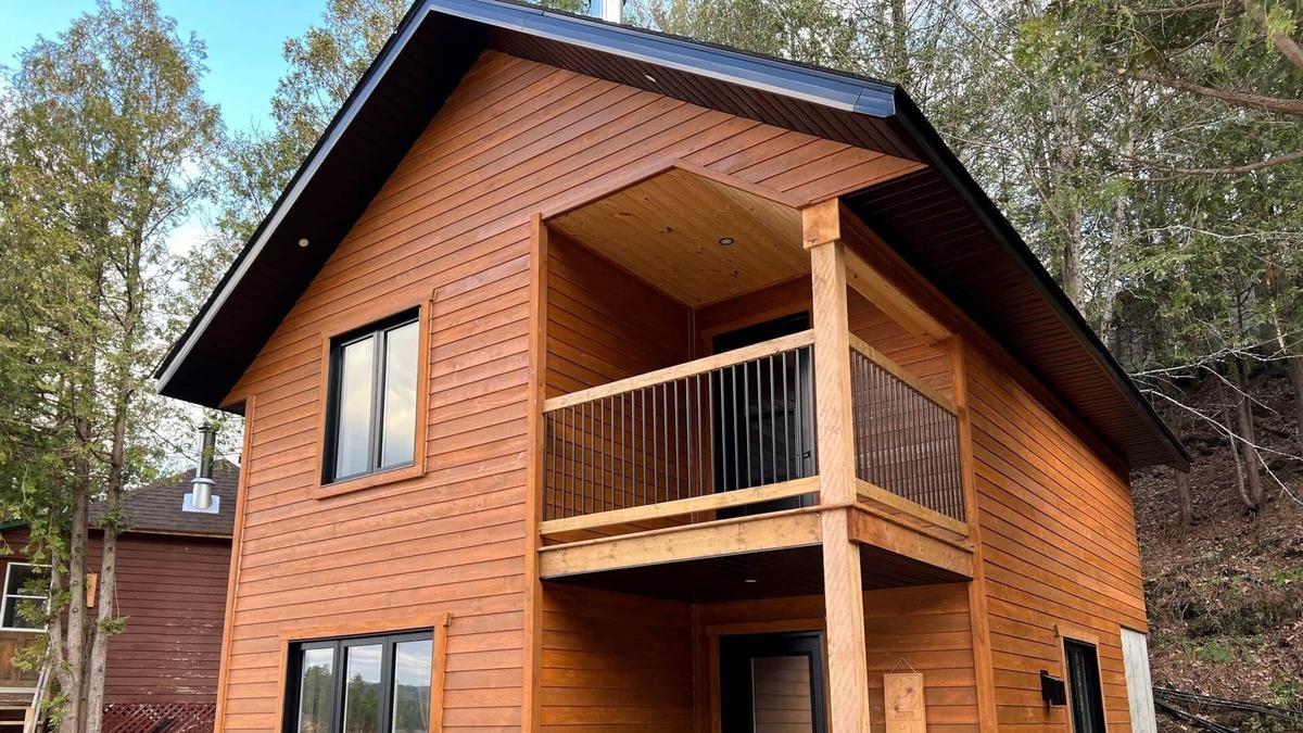 Bowman Ski Chalet | [# 2 The Dog] Cottage on the banks of the river.