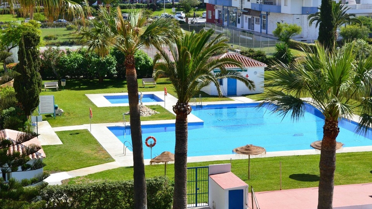 Torrox Costa Apartment | 25 metres to the beach, great sea view and overlooking beautiful pool & gardens