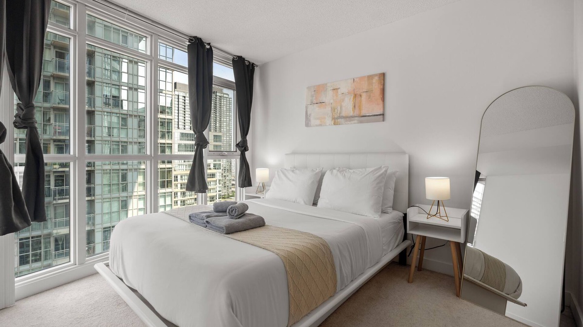CityPlace Condo | 2BD 1 Bath 4 Guests Parking Balcony Near CN Tower Downtown—By Hostia