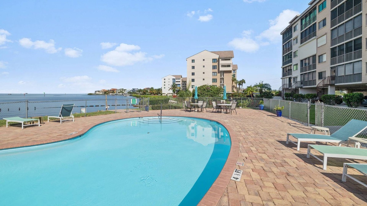 Port Richey Condo | 2BR 2BA Condo Overlooking Gulf with Beach and Pool!