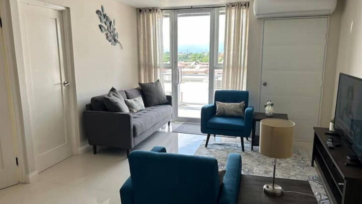 Portmore Apartment | 2BR 2Bth: XL Balcony, 3 beds-Sleeps 5, Adult & Kiddie Pools, 24-hour security