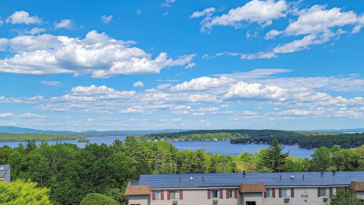 Weirs Beach Condo | 2BR Cozy Escape with Patio, Pool & Nearby Hiking