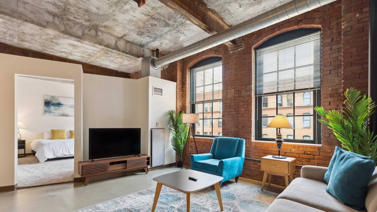 Strip District Apartment | 2BR Historic Loft Retreat With Pool & Gym