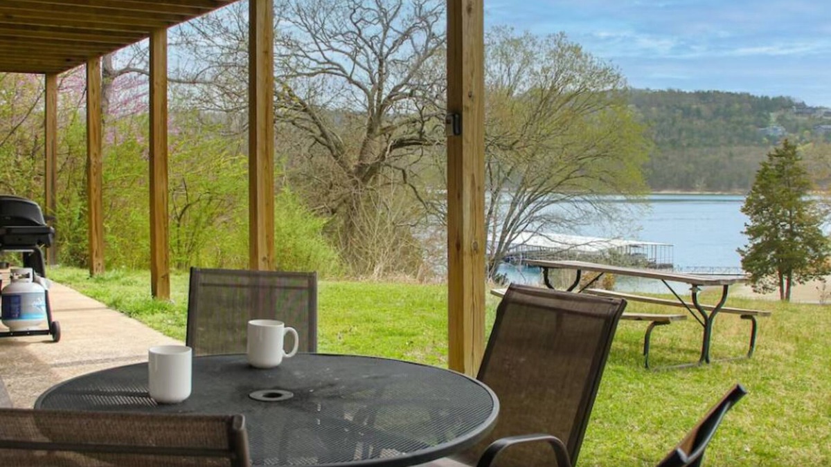 Indian Point Condo | 2BR Waterfront Duplex Cabin w/Pool + Swim & Boat dock