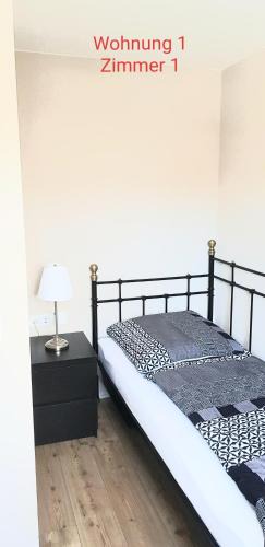 Niederschelden Apartment | 2x Monteurwohnung 1x 2 kleine Einzelzimmer 1x Doppelbett und Schlafcouch im Wohnbereich