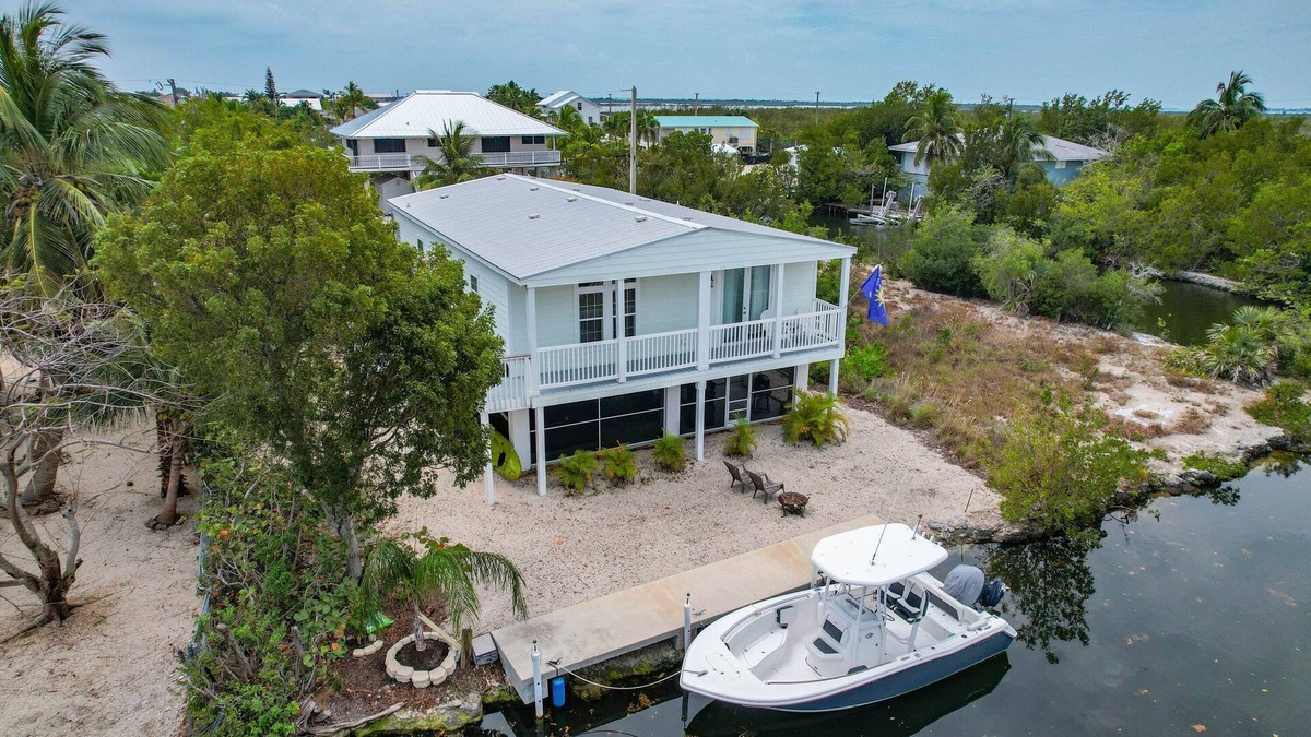 Breezeswept Beach Estates House | 3 Bed 2 Bath Canal Front home with great boating