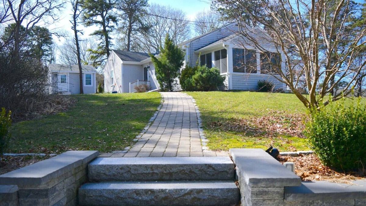 North Falmouth House | 3 bedroom 2 bath Renovated Ranch with Pond Views on peaceful private 1.5 acre lot in North Falmouth