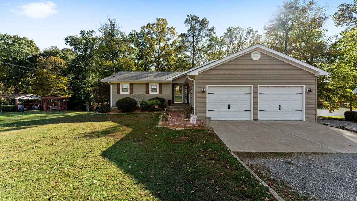 Cadiz House | 3 bedroom/2 full bath lakefront home with gentle slope to private covered dock