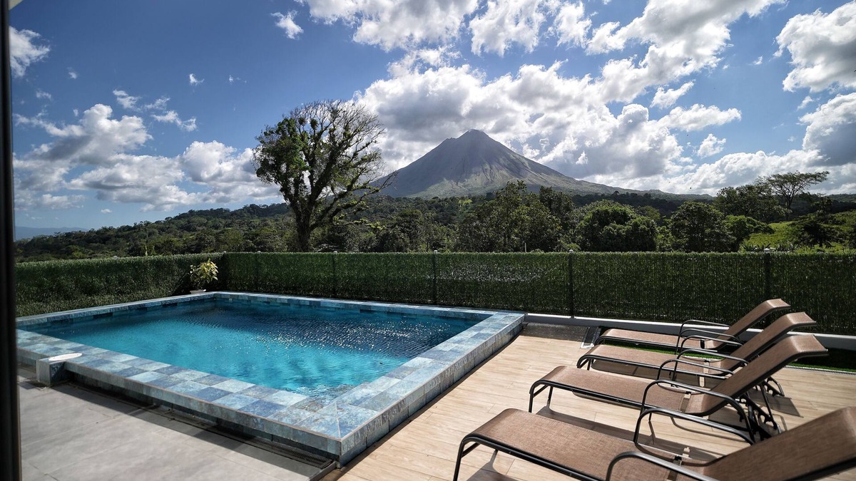 Arenal Hot Springs House | 3-bedroom home with a private heated pool, firepit, sundeck, views, WiFi, and AC