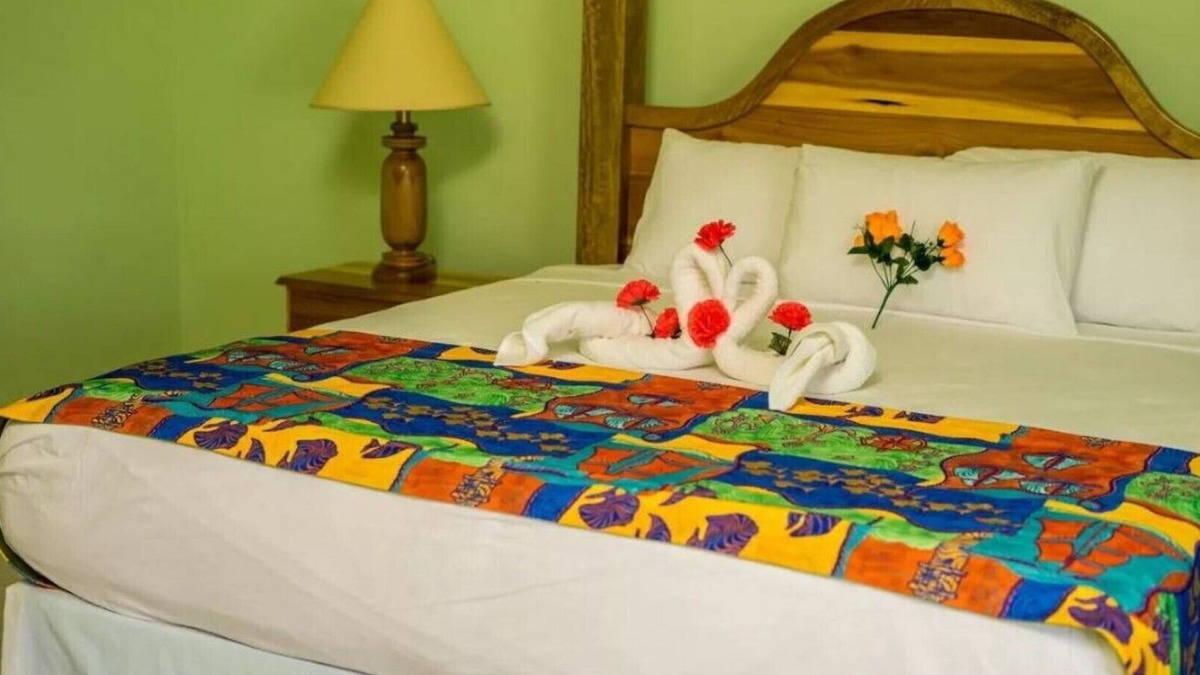 Runaway Bay Resort | 3+ Standard Double 2, 1 Queen Bed, Garden View
