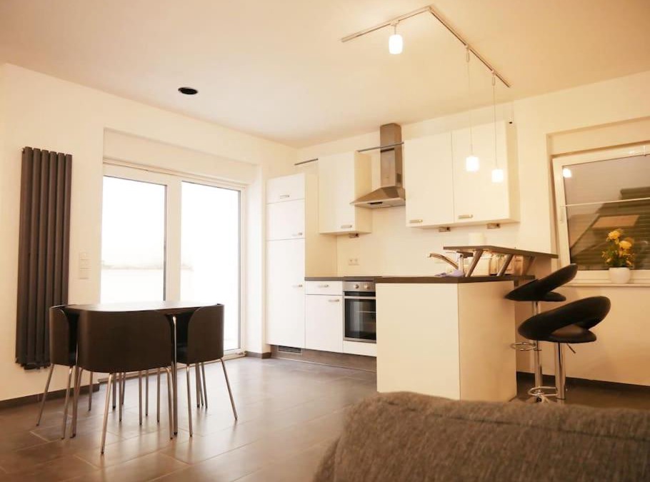 Gruenstadt Apartment | 3 ZKB Einliegerwohnung im Neubau (73m²) mit Ladesäule