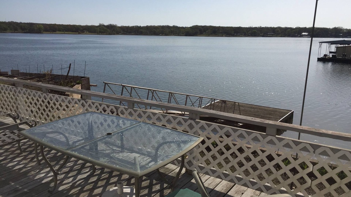 Grove Cottage | 3BR/2BA Lake Front Property For Rent With Lake Dock, RV & Boat Charging Stations