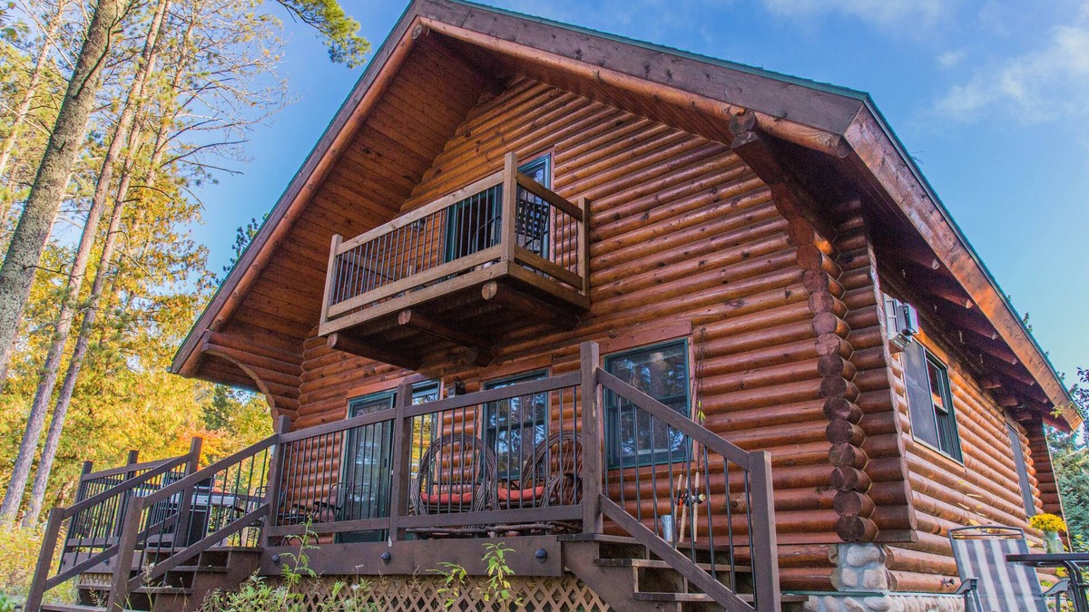 Cook Cabin | 4 bedroom 3 bath Log Cabin with Sand Beach, water toys, sauna, yoga, game room