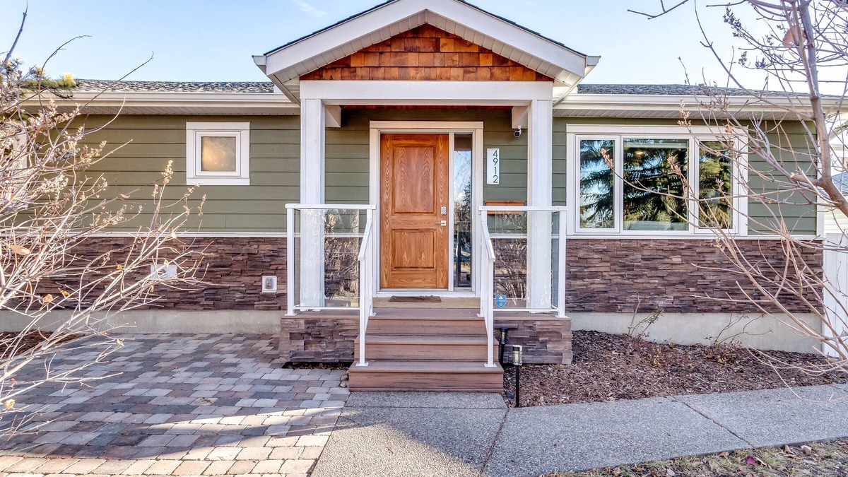 Southwest Calgary House | 4-bedroom detached home with recreation room and hot tub!