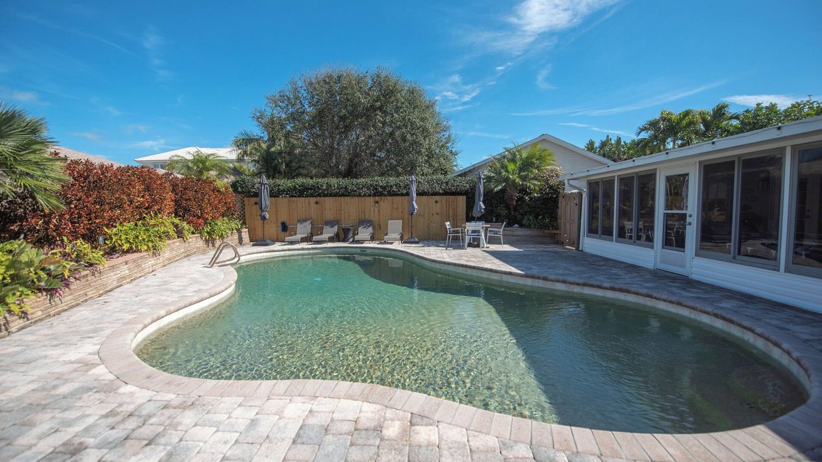 Melbourne Beach House | 4-bedroom house in Melbourne Beach w/heated pool and only steps to the beach