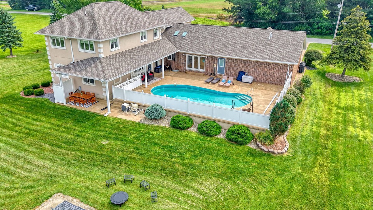 Bellevue House | 5000+ Sq Ft retreat w/pool, tanning bed, and gym near Cedar Point and Lake Erie