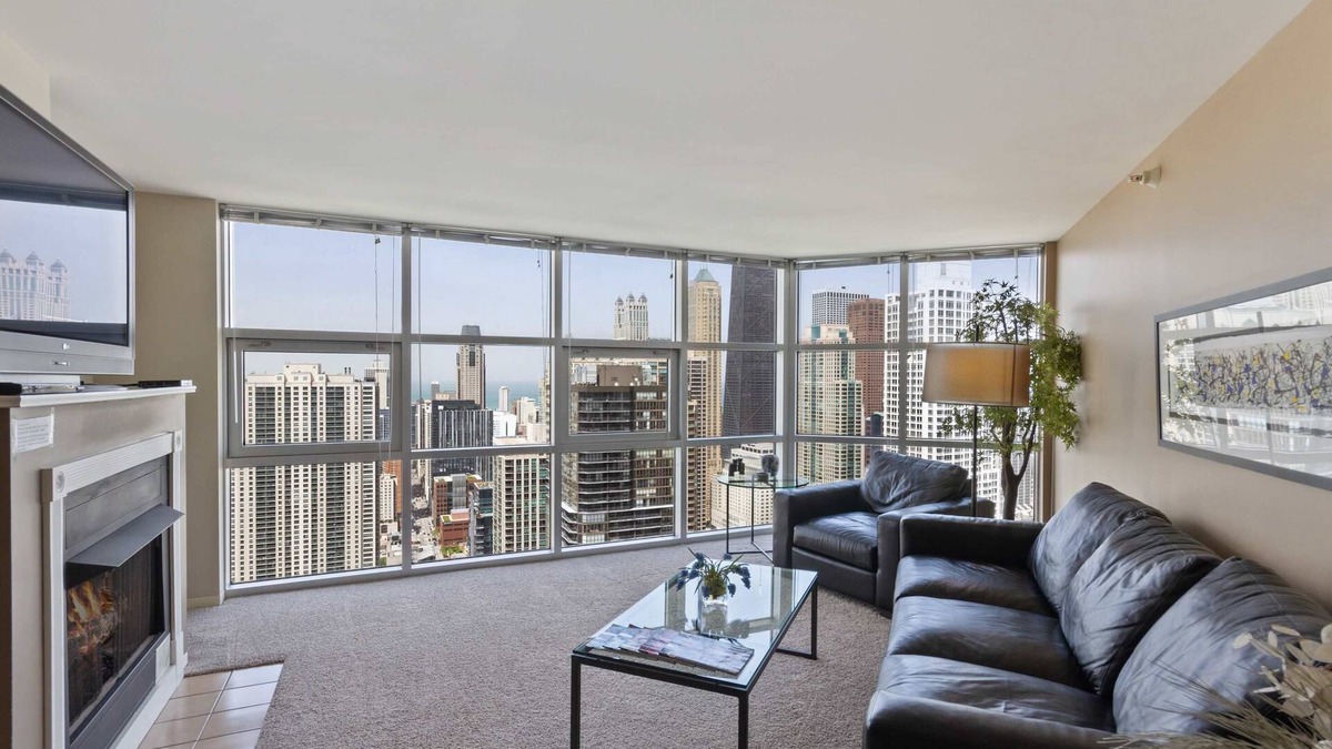 Downtown Chicago Apartment | 52nd Floor MagMile Penthouse VIEWS Fireplace Pool