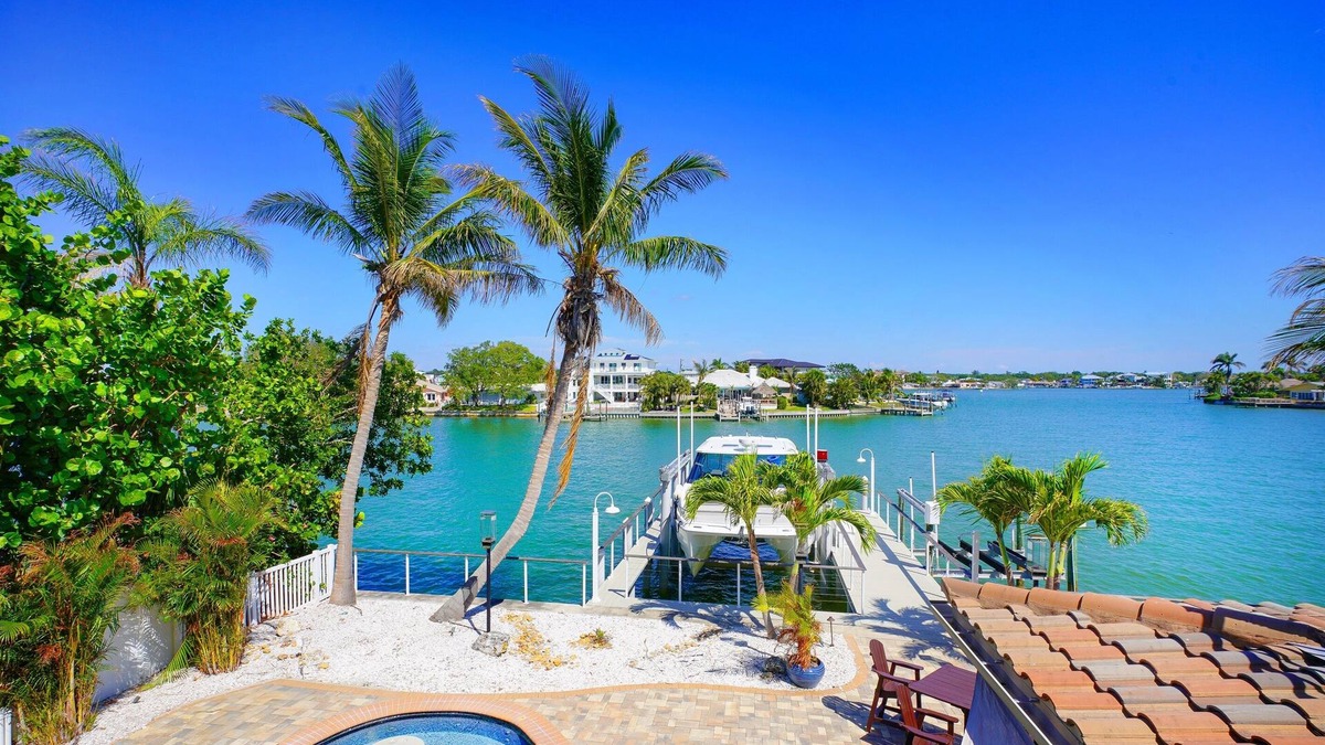 Indian Rocks Beach House | 5BR/6BA Waterfront Pool/Spa (2) 6-pass golf carts