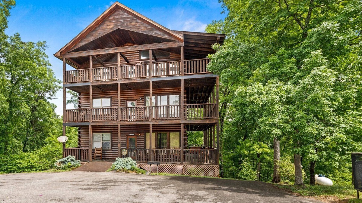 Sevierville Cabin | 6 Master Suites, Sleeps 28, Arcade, Hot Tub, Pool Table, Game Room and More!