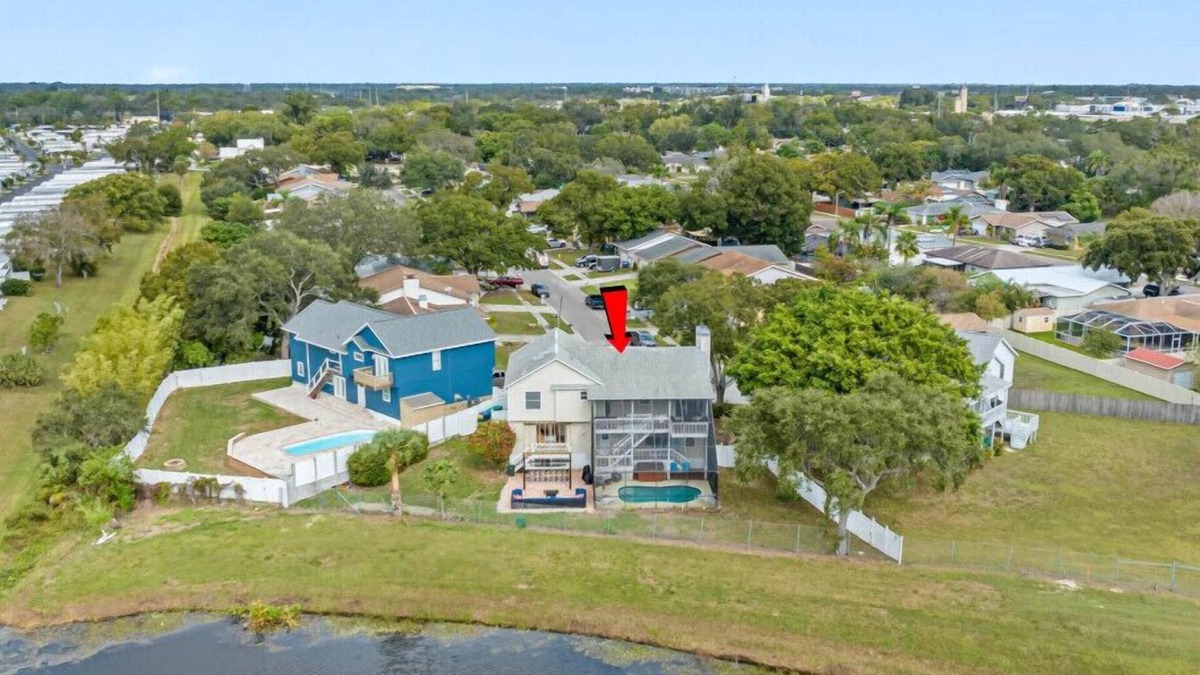 Largo Apartment | 6BR Waterfront Heated Pool Hot Tub Game Room Firepit