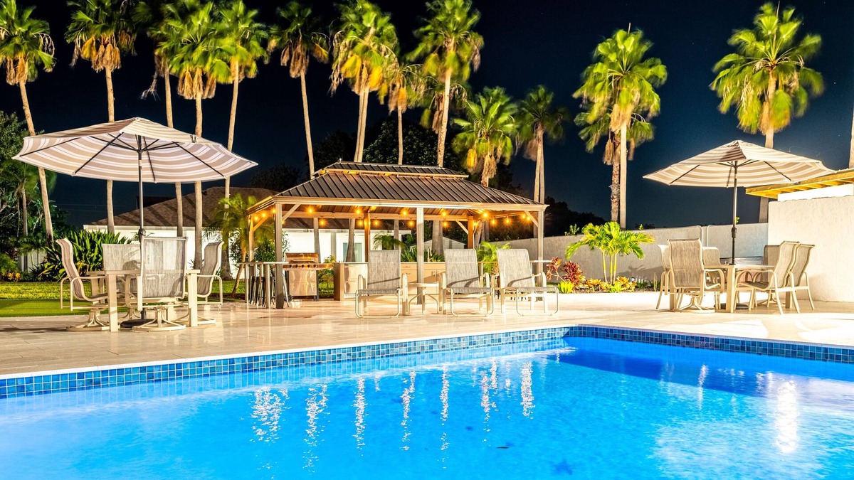 Palma Sola House | 75 Palms! 8 Bedroom Home by RedAwning