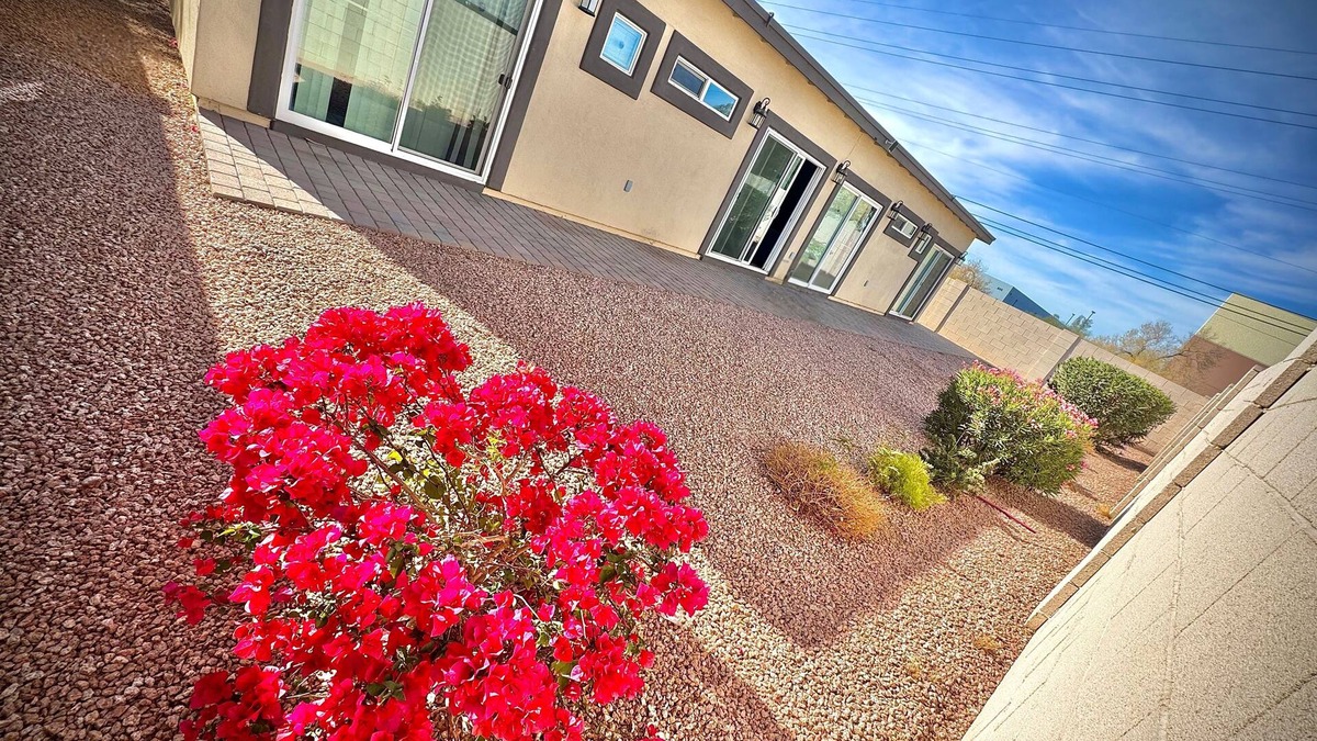 Estrella Village House | 9-Bedroom 7 bath Phoenix home with Modern Amenities & Patio Access & Events