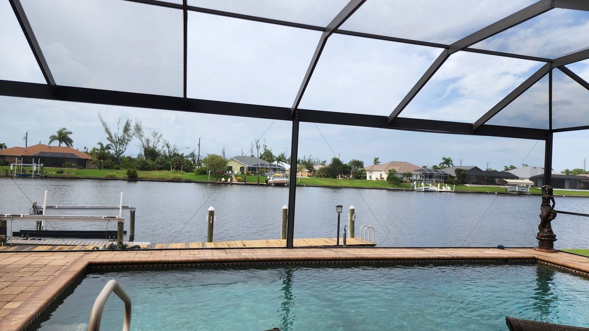 South Gulf Cove House | A 100+ reviews Family friendly home on canal with gulf access and heated pool!