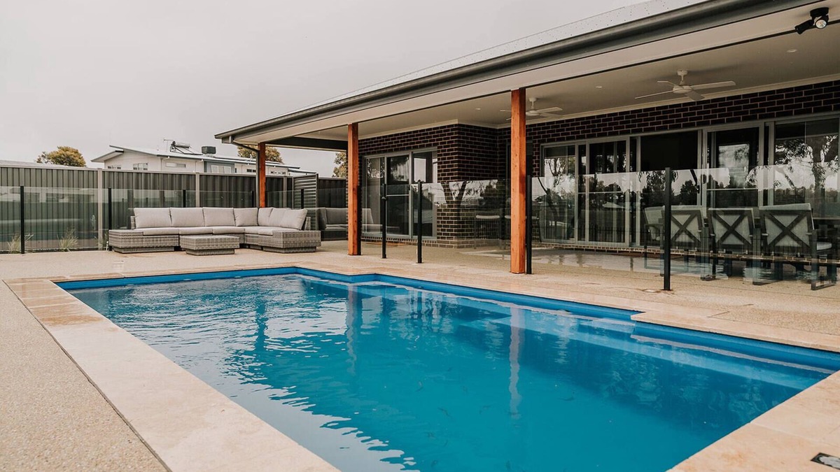 Yarrawonga House | A Brand New Home with a Pool overlooking The Black Bull Golf Course