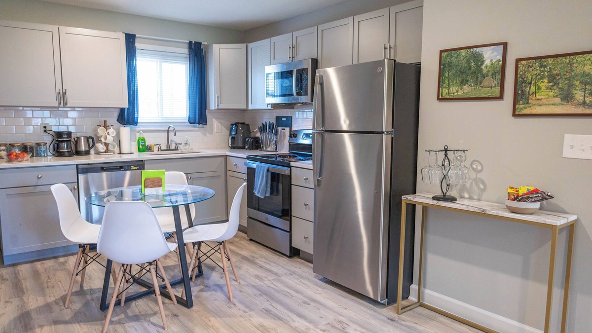 Shawnee Apartment | A charming bedroom with a king bed in quiet Shawnee neighborhood near highways.