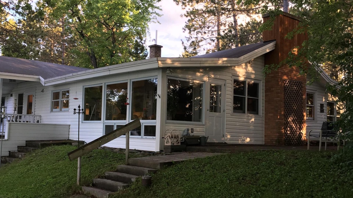 Eveleth House | A charming home on a beautiful peninsula on a crystal clear lake.
