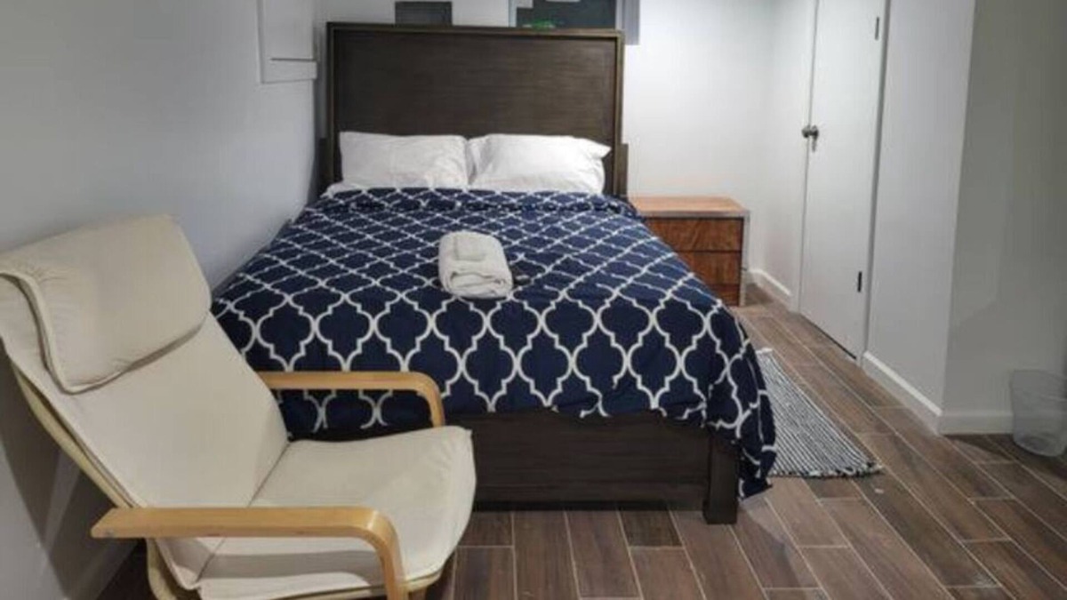 Weequahic Apartment | A cozy basement with queen-size beds Free WiFi, and a Smart TV with Roku.