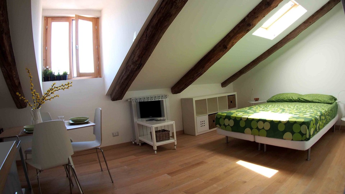 Vanchiglia Apartment | A cozy bohemian rooftop nest in downtown Turin